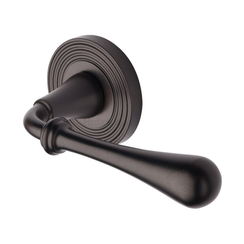 Roma Reeded Door Handle on Round Rose - RR7156-MB